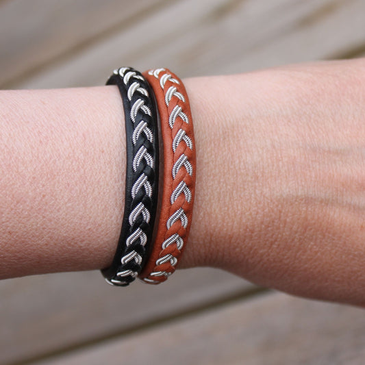 Lapland sami bracelets in leather and pewter worn on wrist