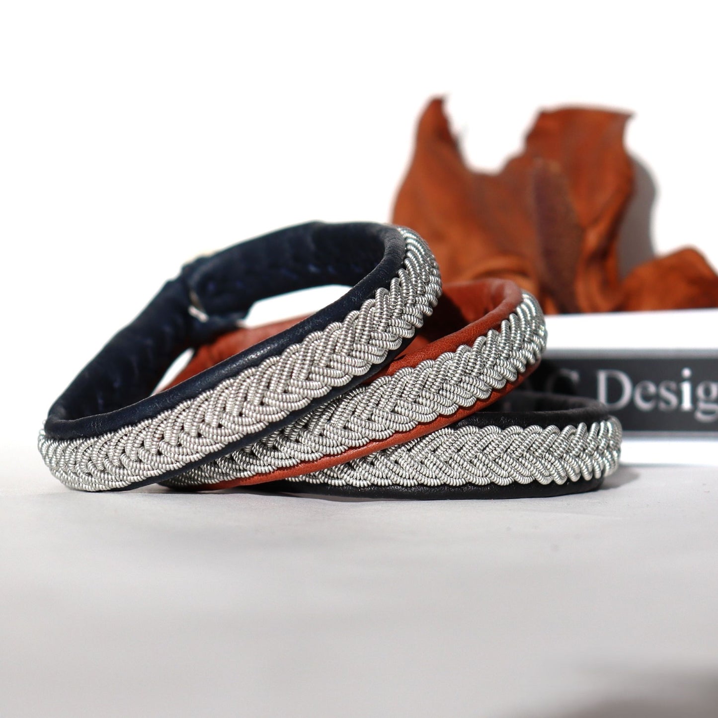 Hancrafted Sami bracelets in leather with pewter braids, by AC Design