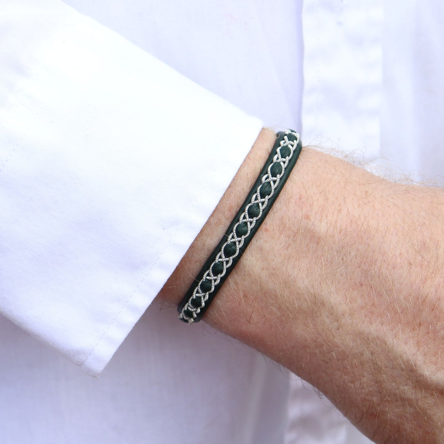 Sami bracelet Eir in color forest green worn on a mans wrist