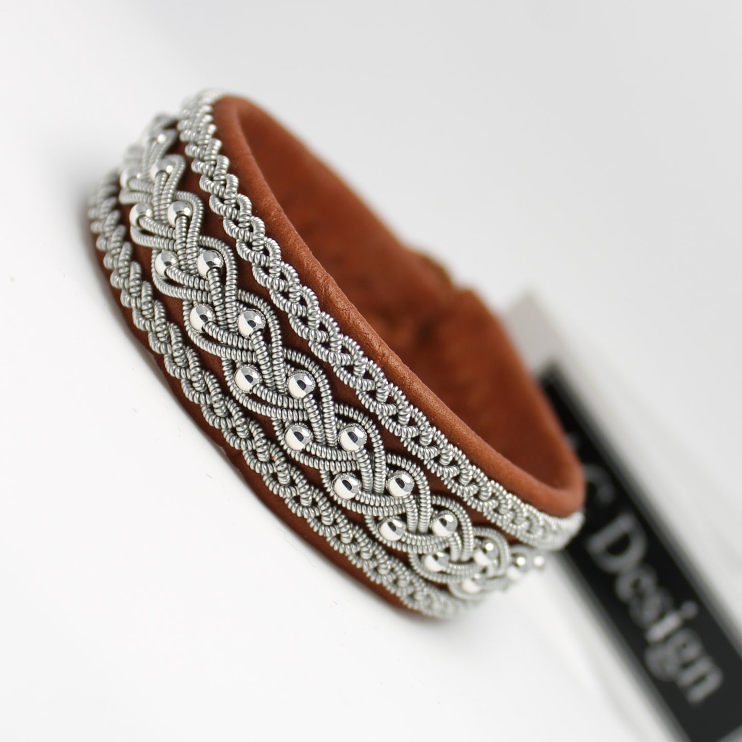 Handcrafted Sami leather bracelet with pewter braids and silver beads