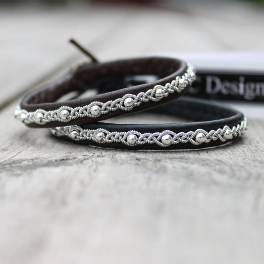Sami bracelets in reindeer leather with pewter wire braids and silver beads