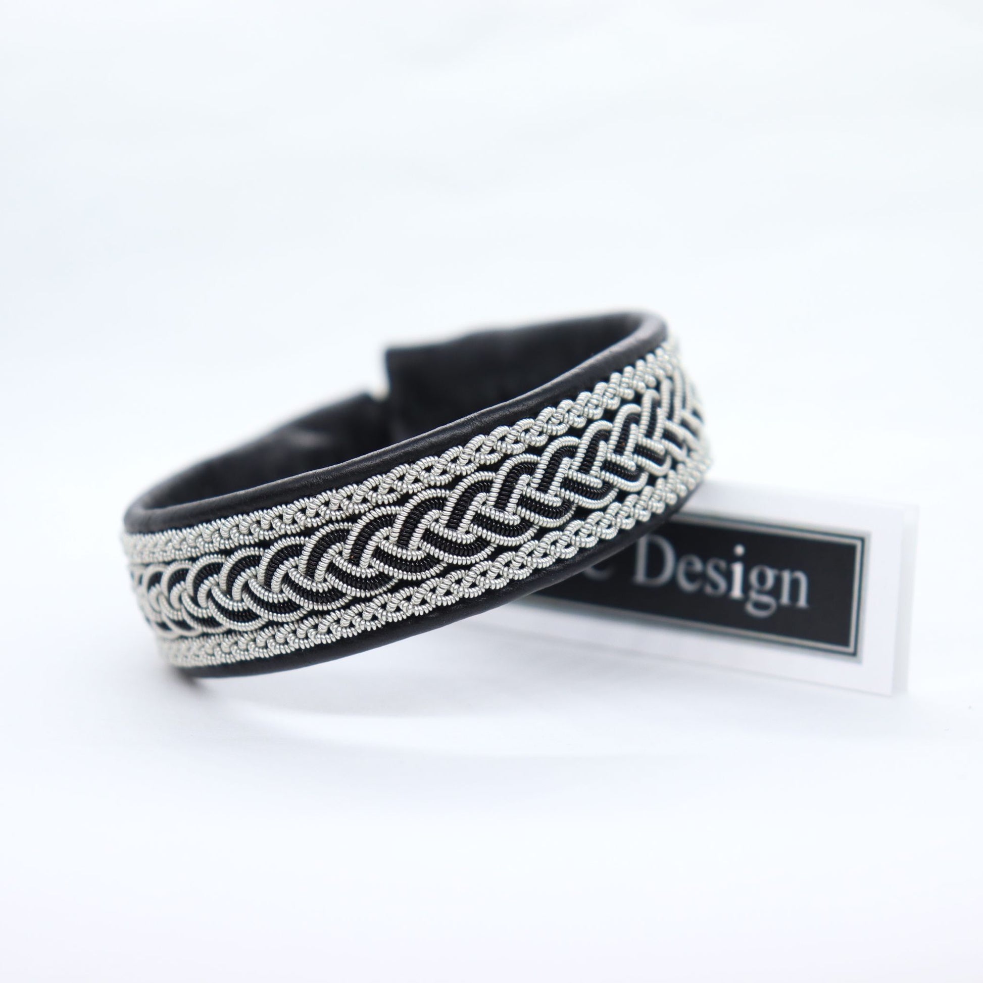 Handmade Sami bracelet in black leather, pewter and copper braids