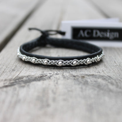 Handcrafted slim Sami leather bracelet with braided pewter thread and silver bead accents