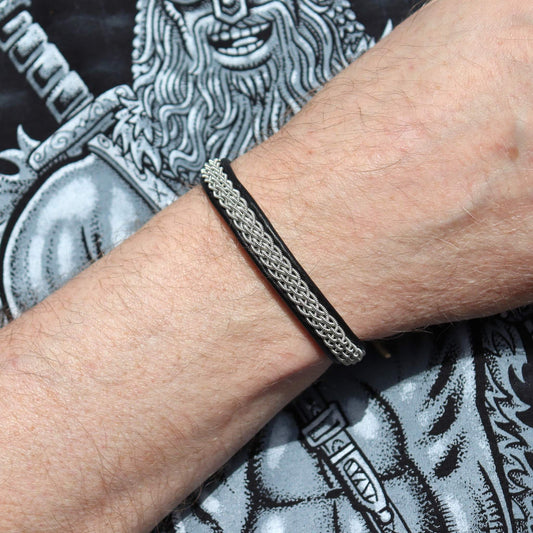 Slim Sami leather bracelet with braided pewter thread shown on wrist