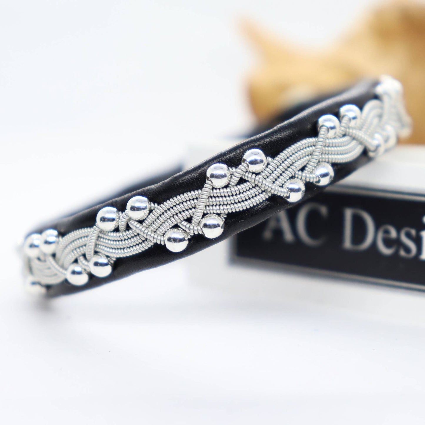 Sami bracelet in black genuine leather and sterling silver beads.