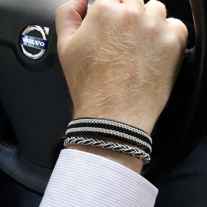 Handmade Sami Bracelet worn on mans wrist in a Volvo Car