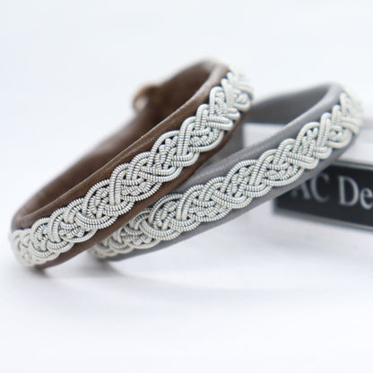 Handmade sami bracelets in reindeer leather and pewter braids