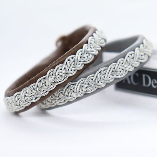 Handmade sami bracelets in reindeer leather and pewter braids