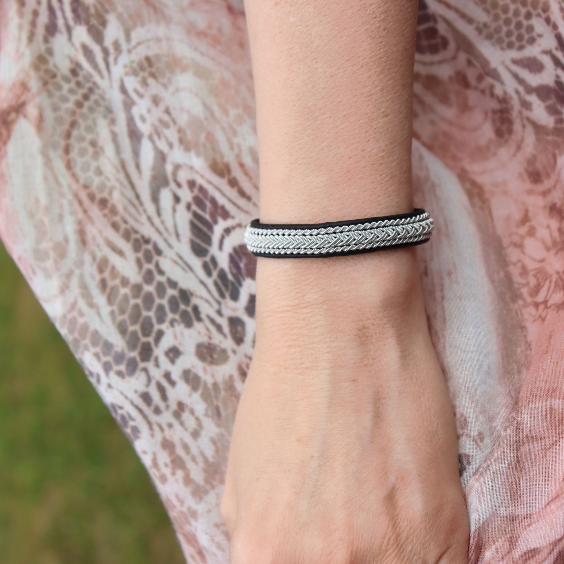 Narrow Sami bracelet worn on womans wrist