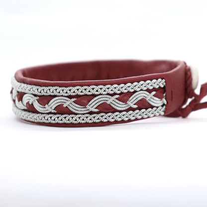 Handcrafted Sami bracelet in red leather with braided pewter thread