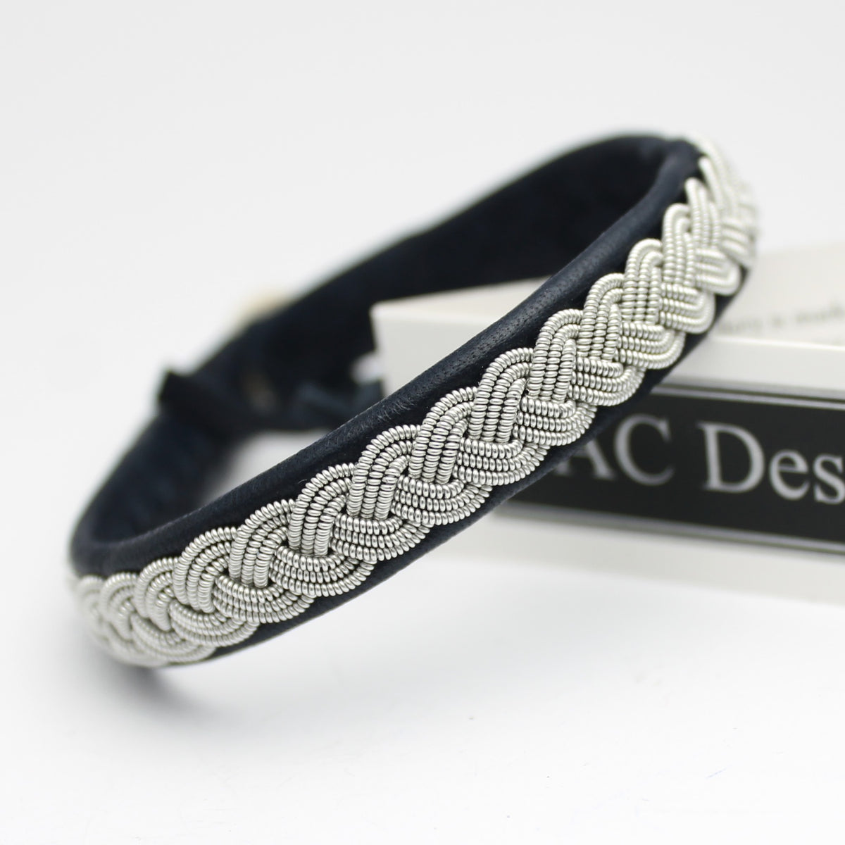 Swedish Sami bracelet in reindeer leather and pewter wire braid