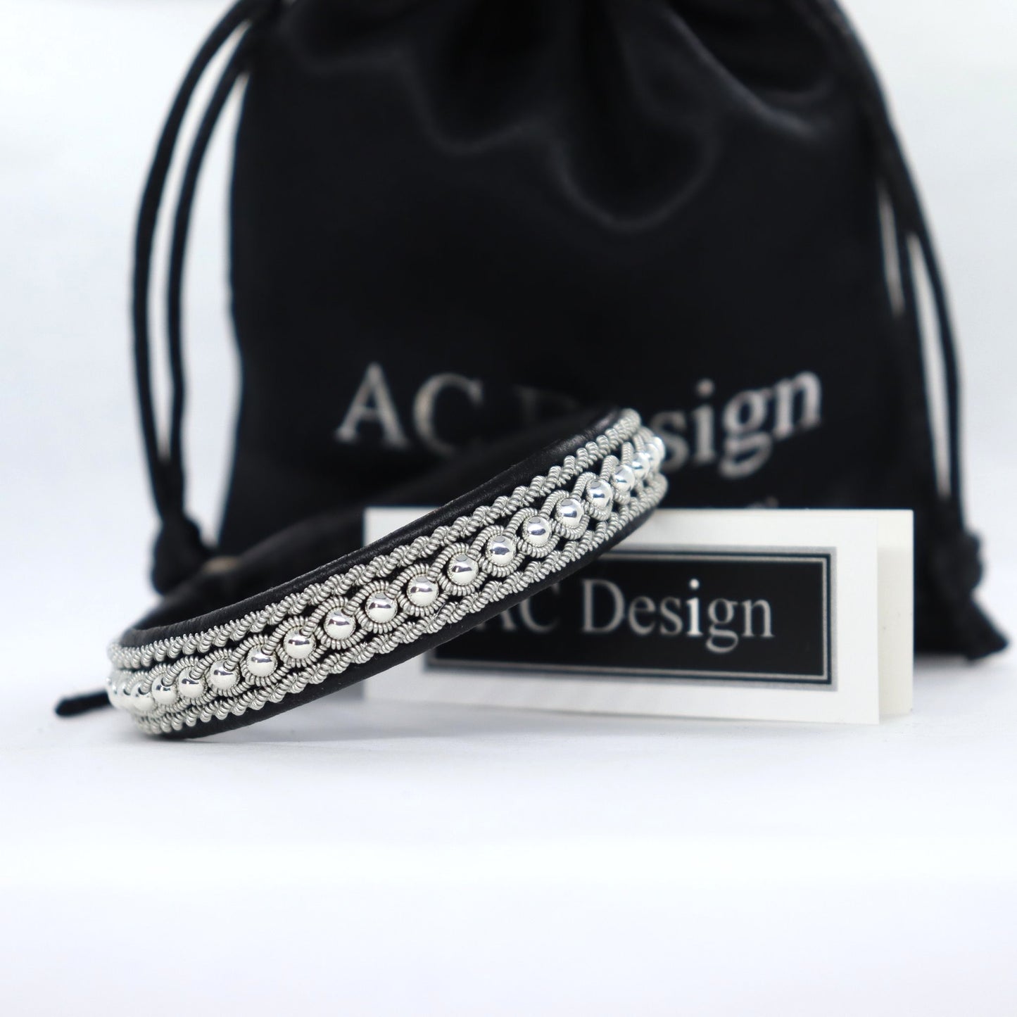 Black Sami bracelet in leather and braid with silver beads