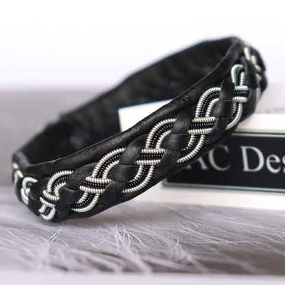 Sami leather bracelet with braided pewter thread and decorative black copper wire