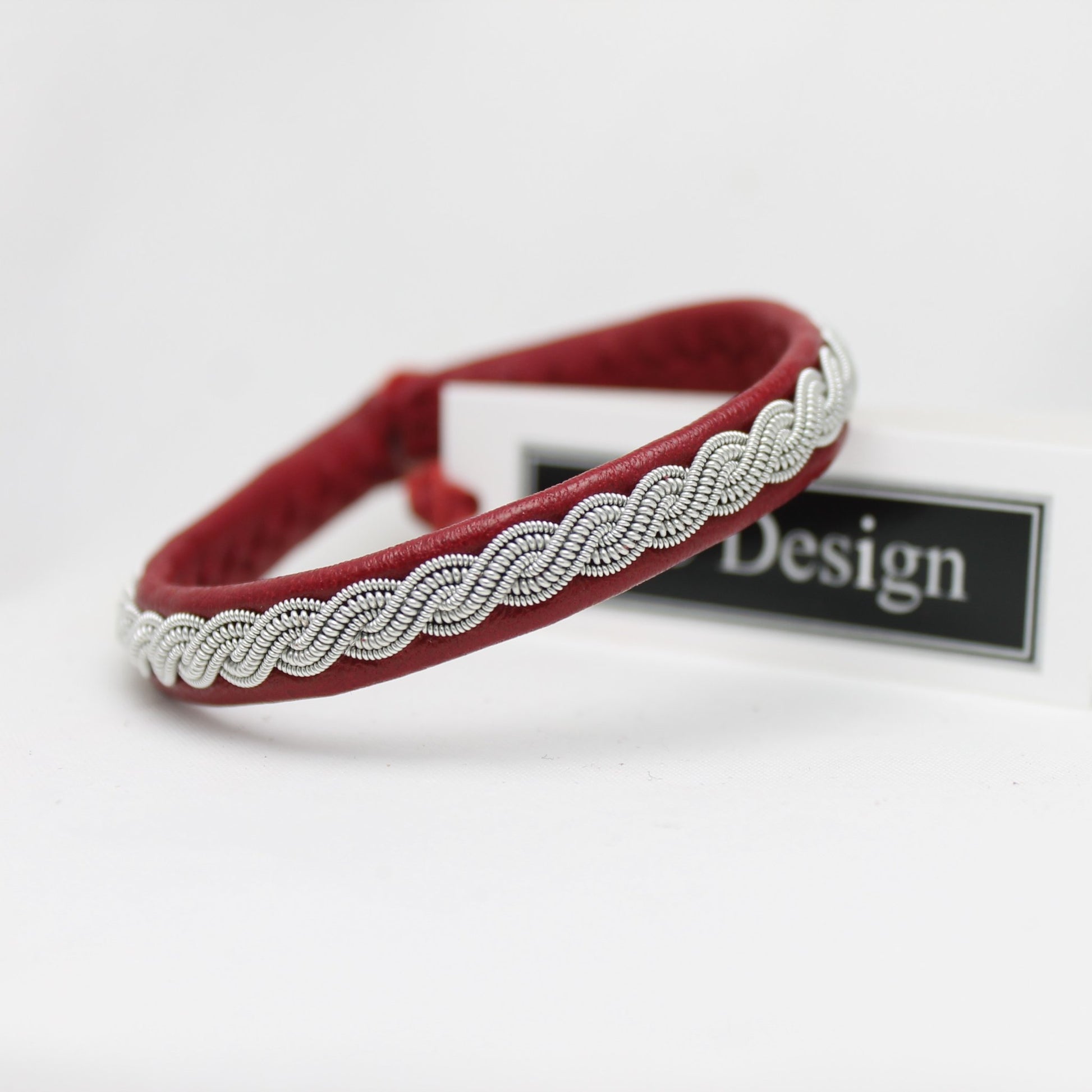 Sami bracelet with pewter wire braid and leather color red