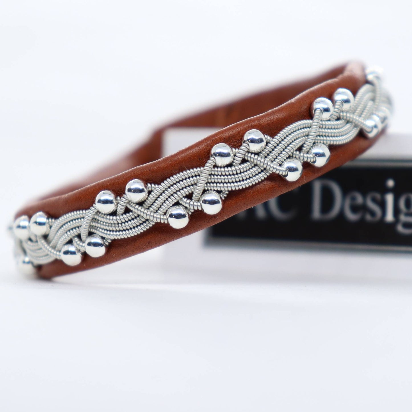 Sami bracelet in leather with sterling silver beads.