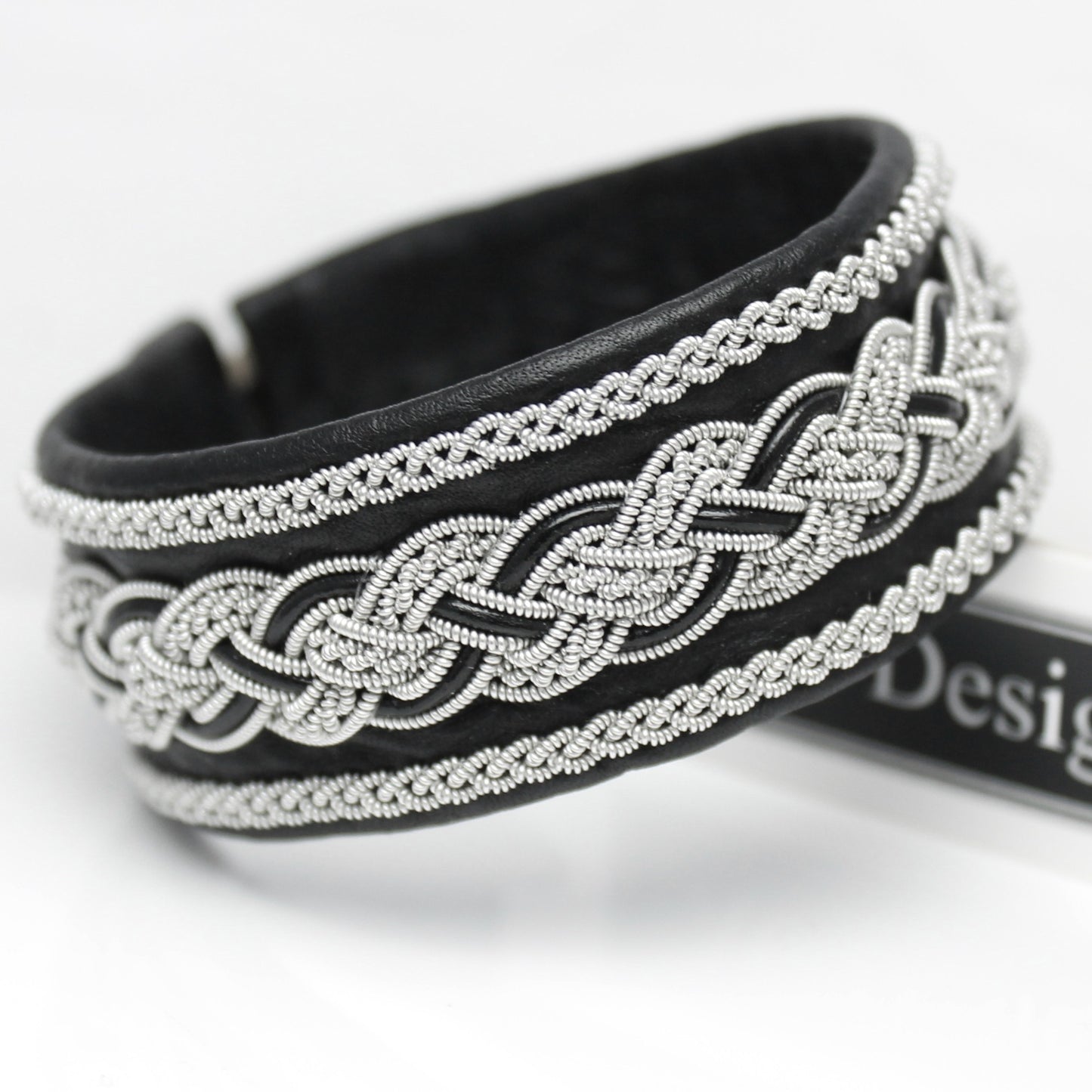 Black handcrafted Sami bracelet in soft leather with pewter braid and leather cord accents