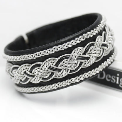 Black handcrafted Sami bracelet in soft leather with pewter braid and leather cord accents