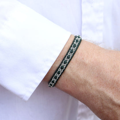 Sami bracelet Eir in color forest green worn on a mans wrist