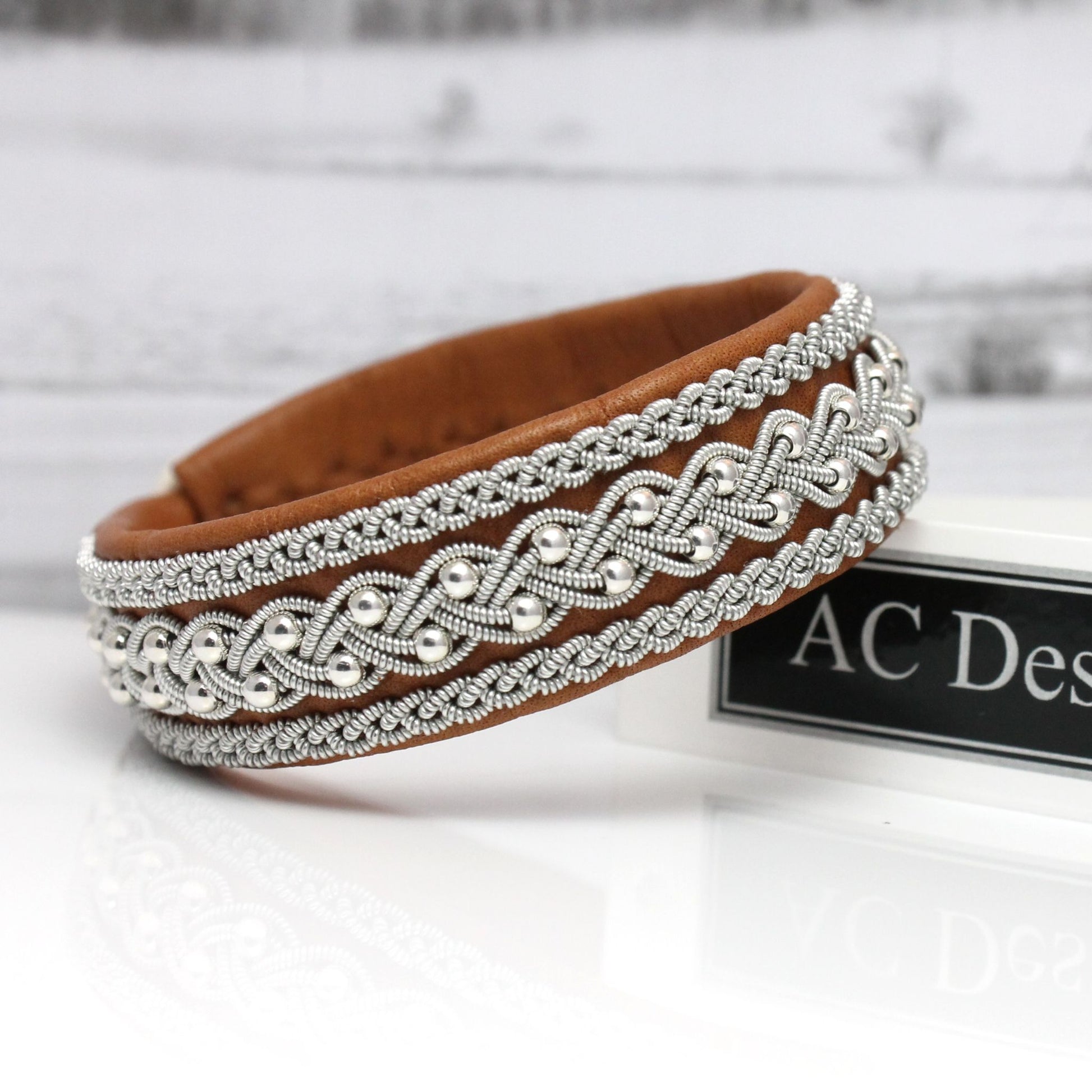 Sami bracelet in nature brown reindeer leather with pewter braids and silver beads