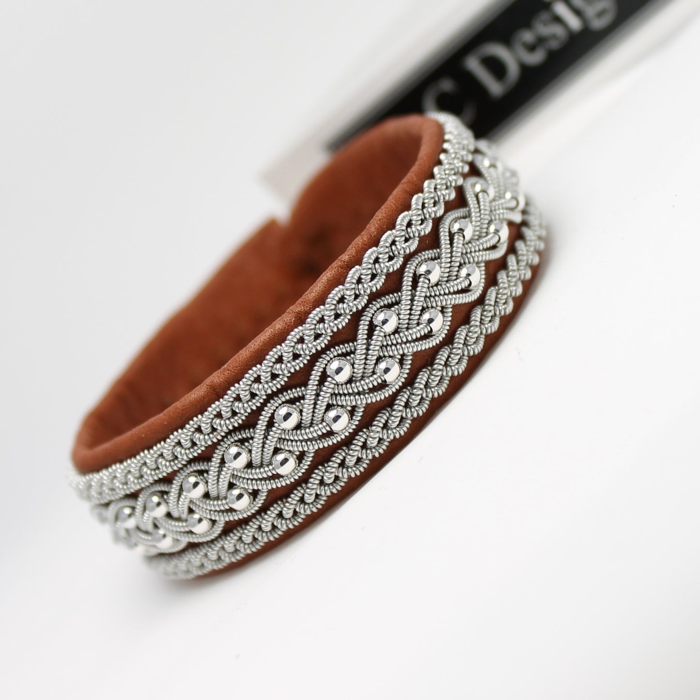 Sami style leather bracelet with pewter braids and sterling silver beads