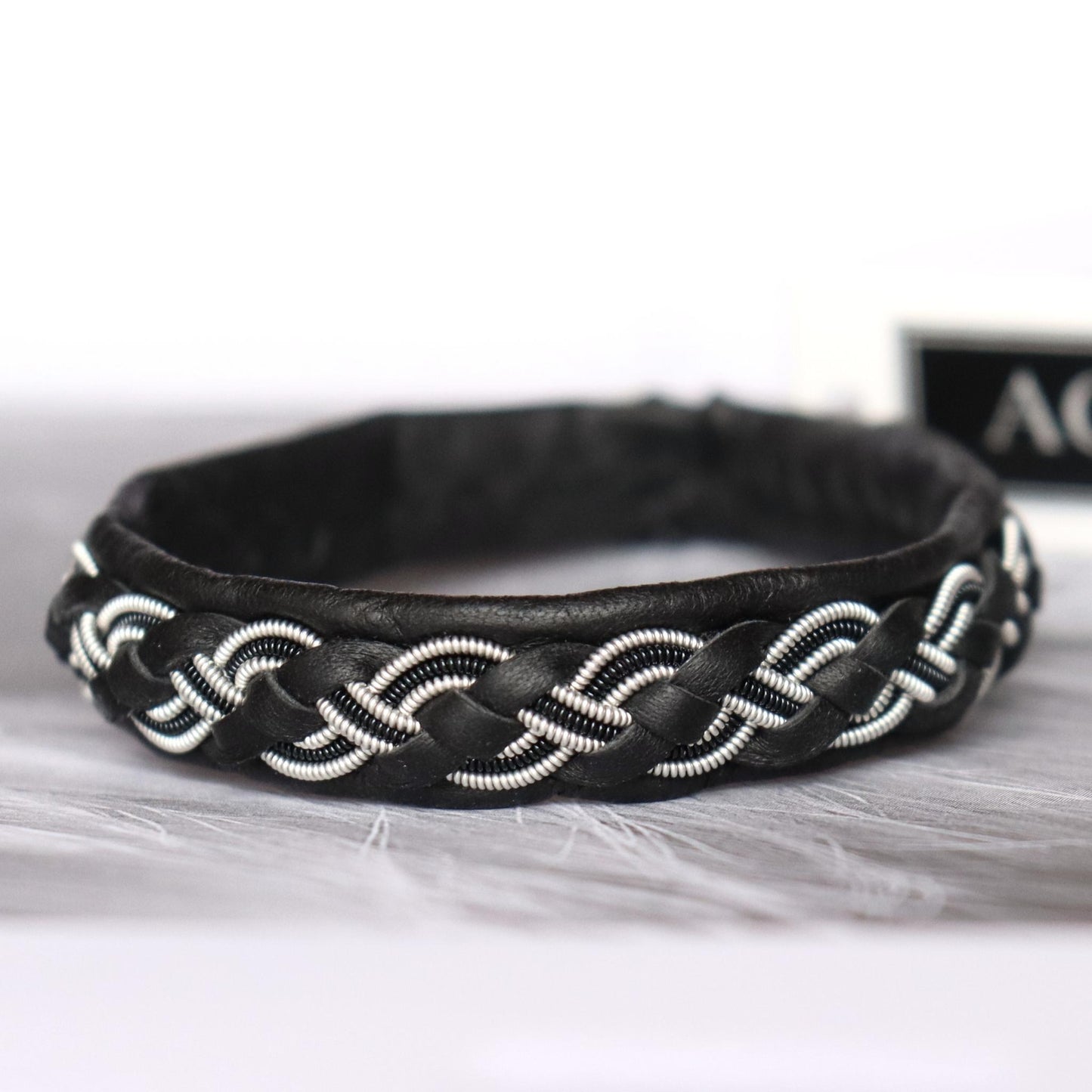 Sami leather bracelet with braided pewter wire and decorative copper wire