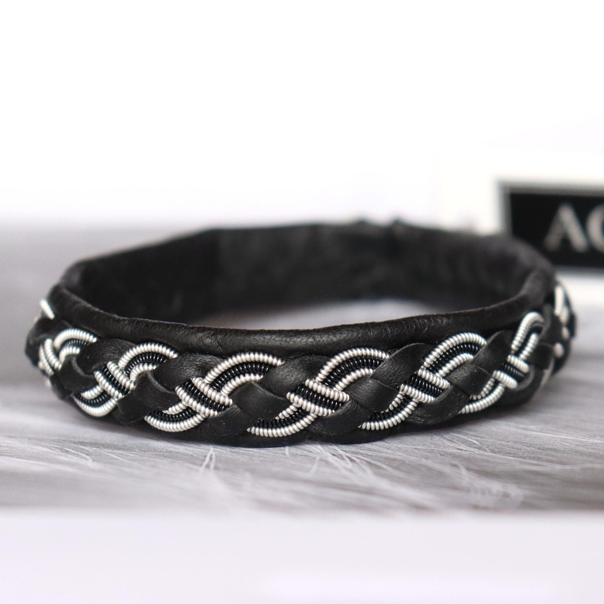 Sami leather bracelet with braided pewter wire and decorative copper wire
