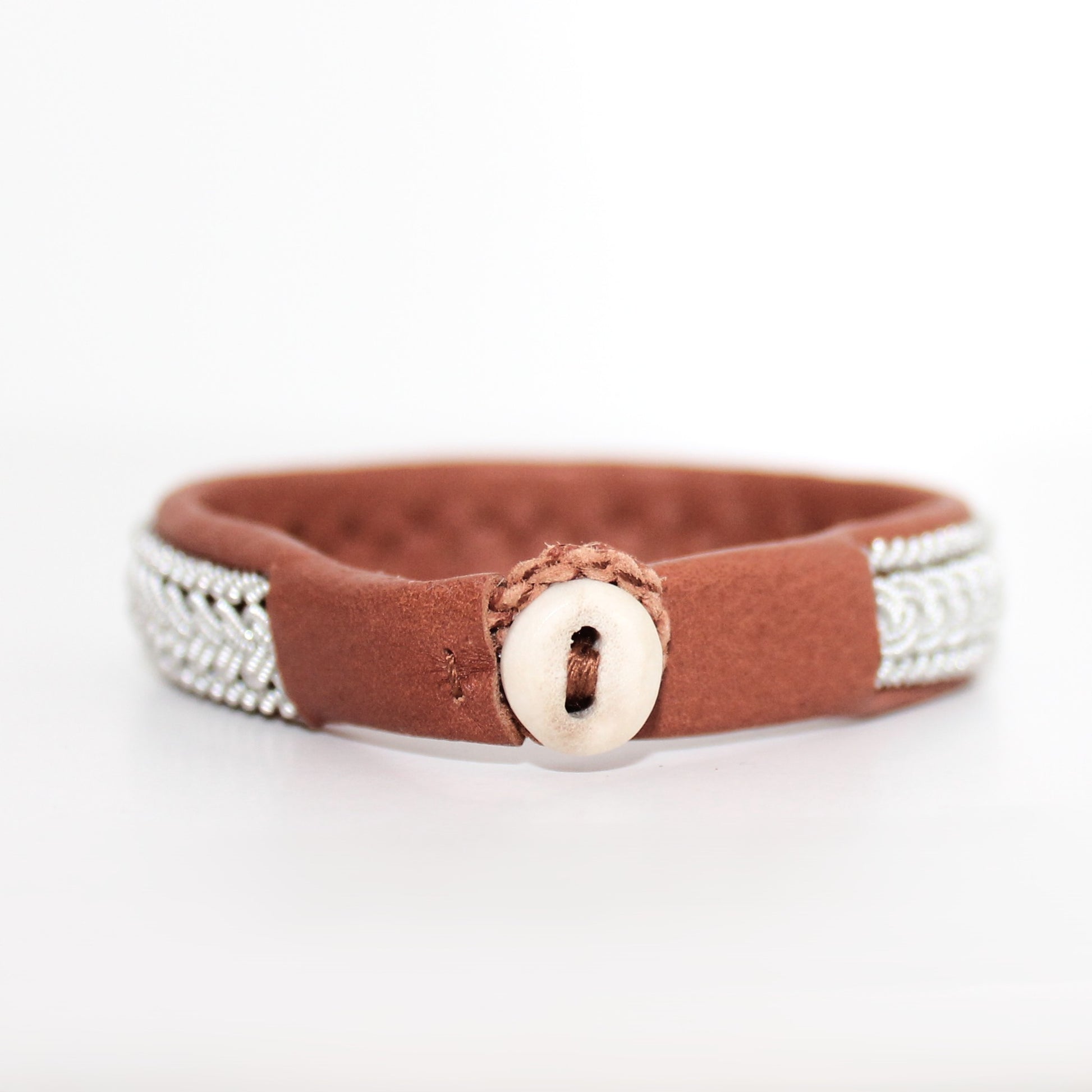 Reindeer antler button on a Sami bracelet