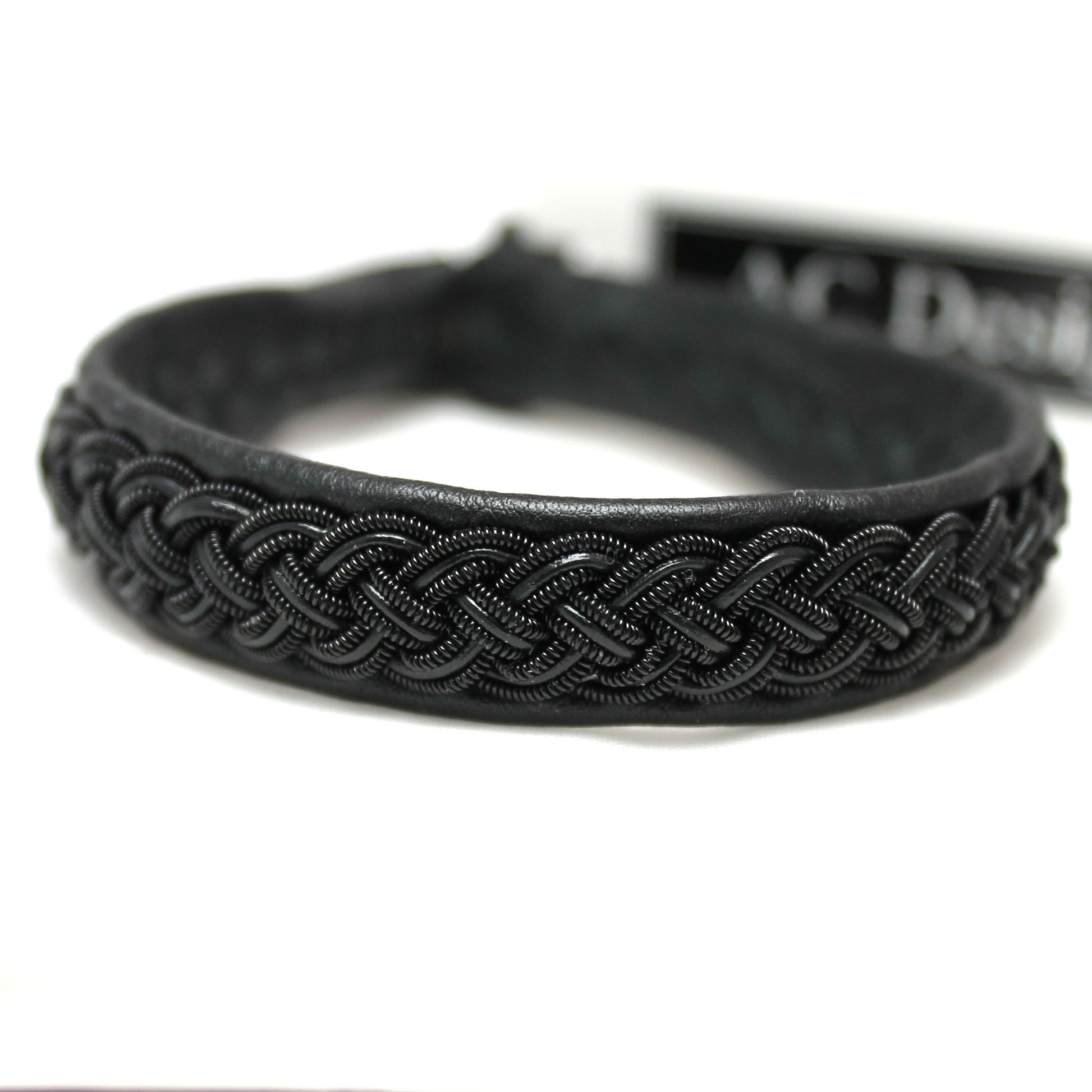 sami bracelet in black copper wire, leather and cord