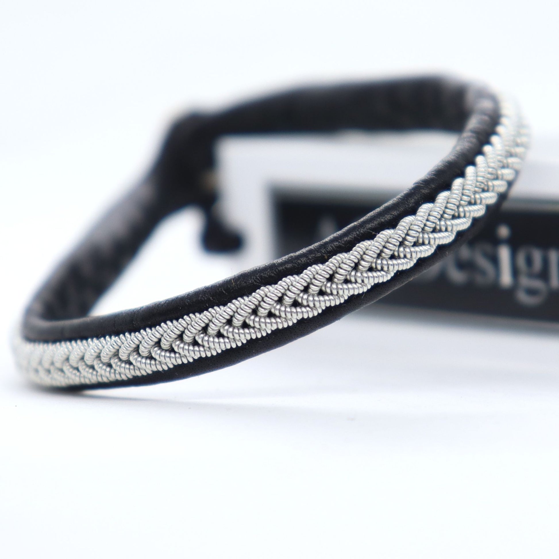 Sami bracelet with pewter wire braid and black leather