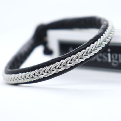 Sami bracelet with pewter wire braid and black leather