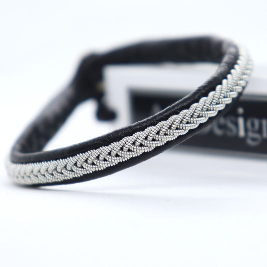 Sami bracelet with pewter wire braid and black leather