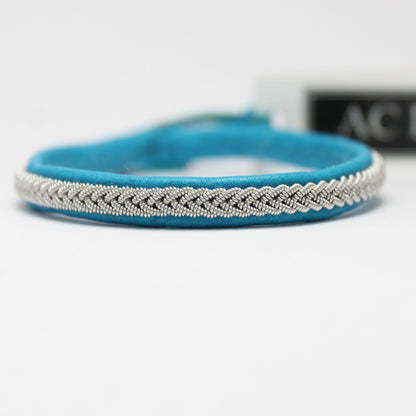 Sami bracelet with pewter wire braid and leather color aqua