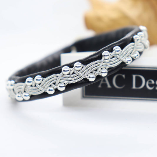 Black Sami bracelet in leather with sterling silver beads.