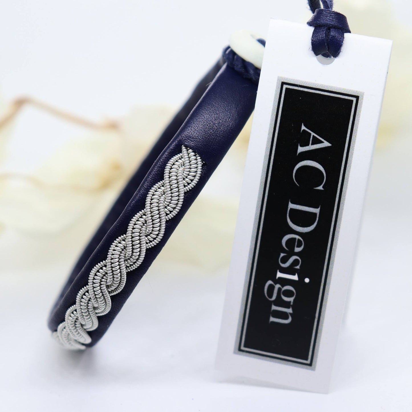 Sami bracelet with pewter wire braid and leather