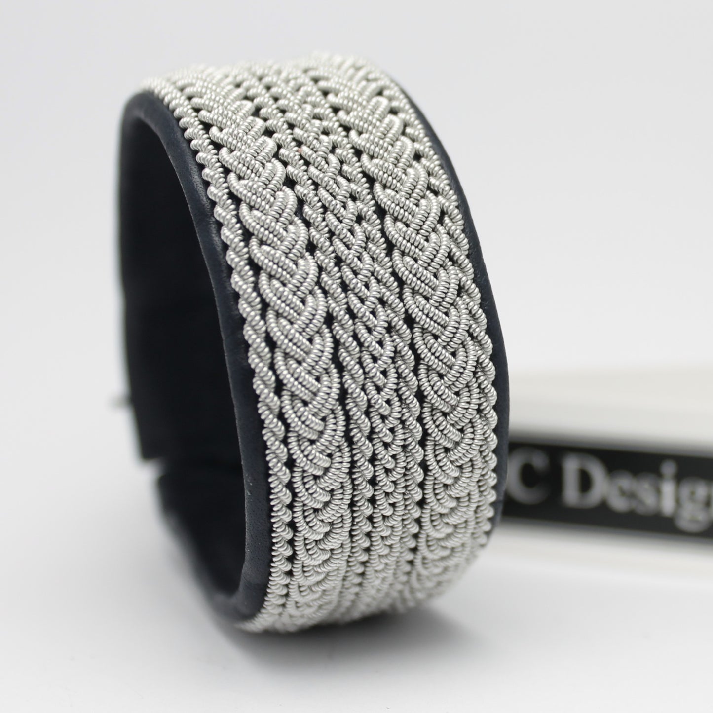 Wide sami bracelet in reindeer leather and pewter wire braids