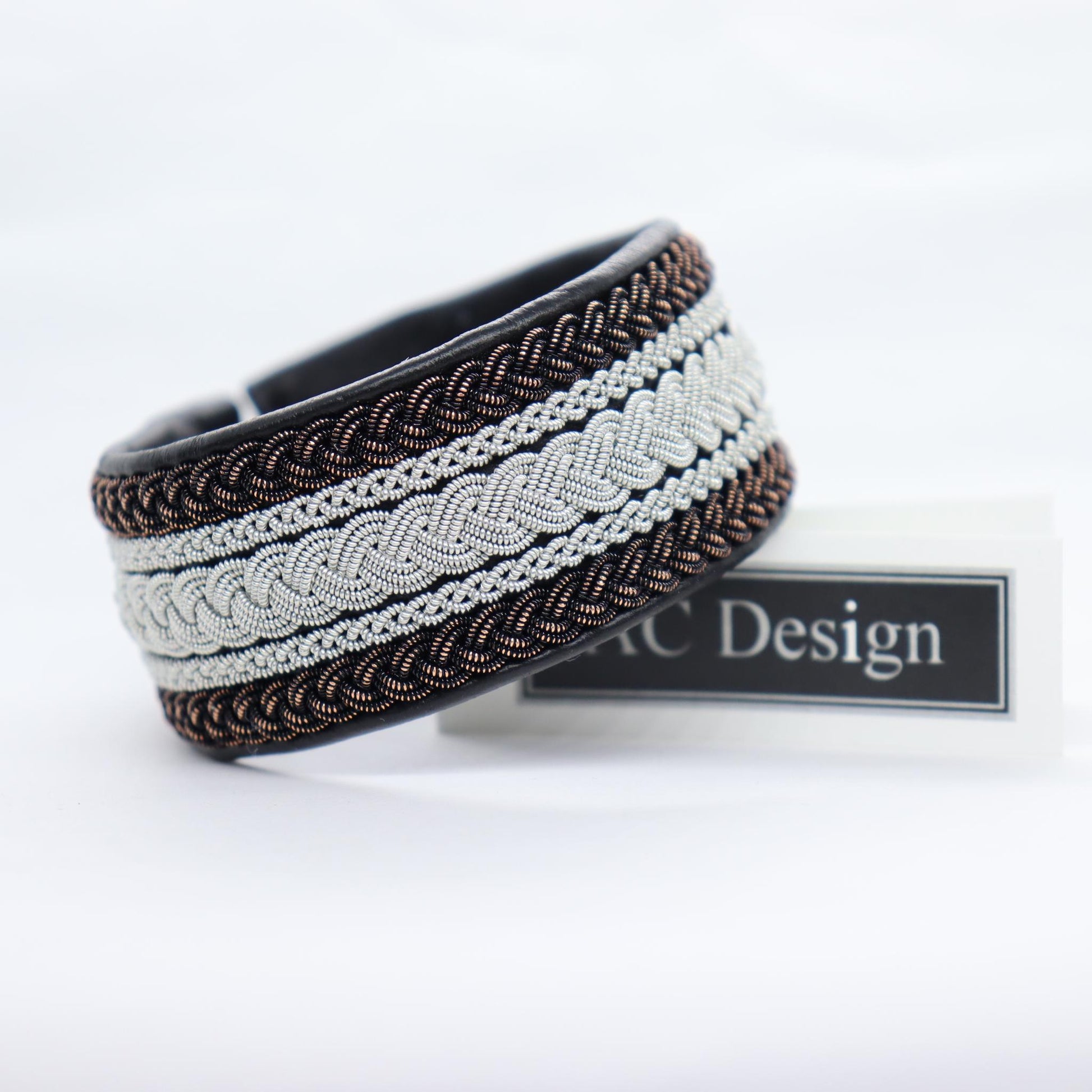 Sami style bracelet in leather with braids in pewter and copper