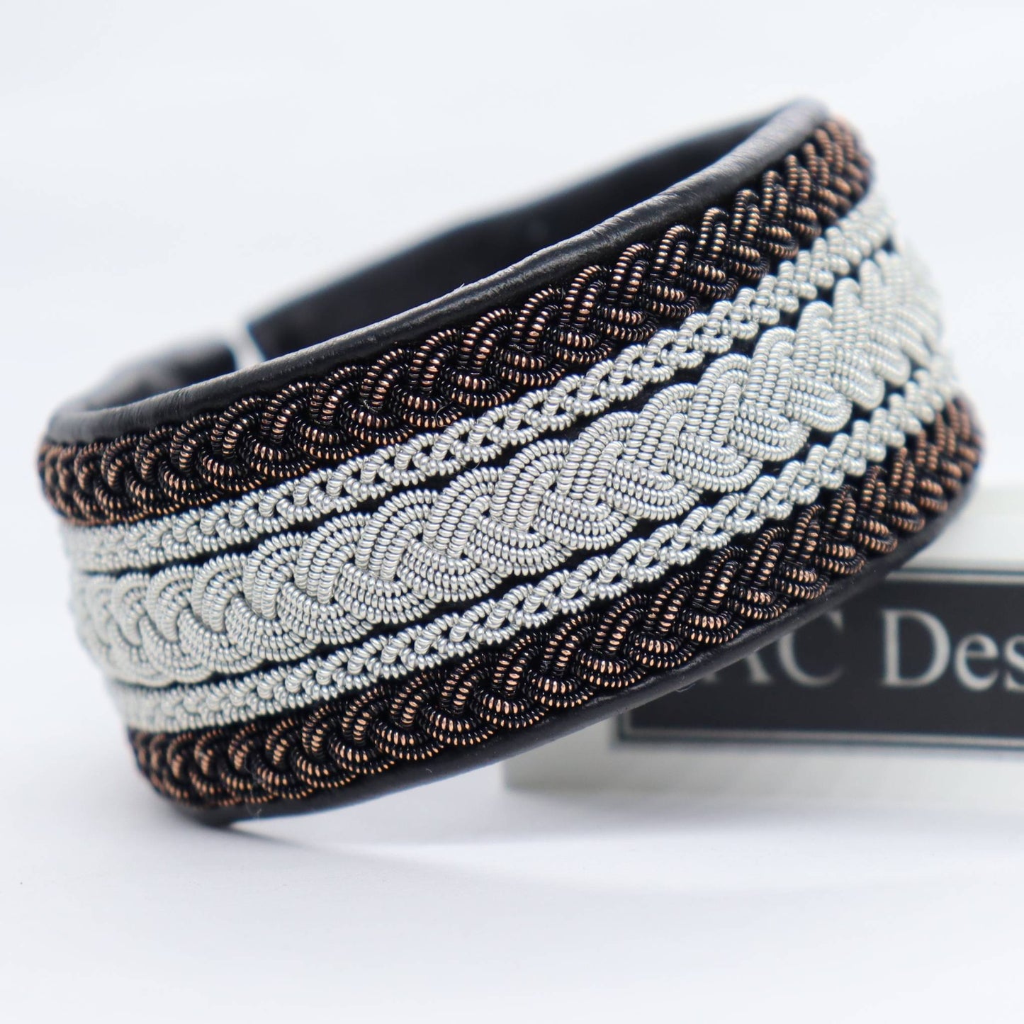 Nordic Sami cuff in leather with braids in pewter and copper