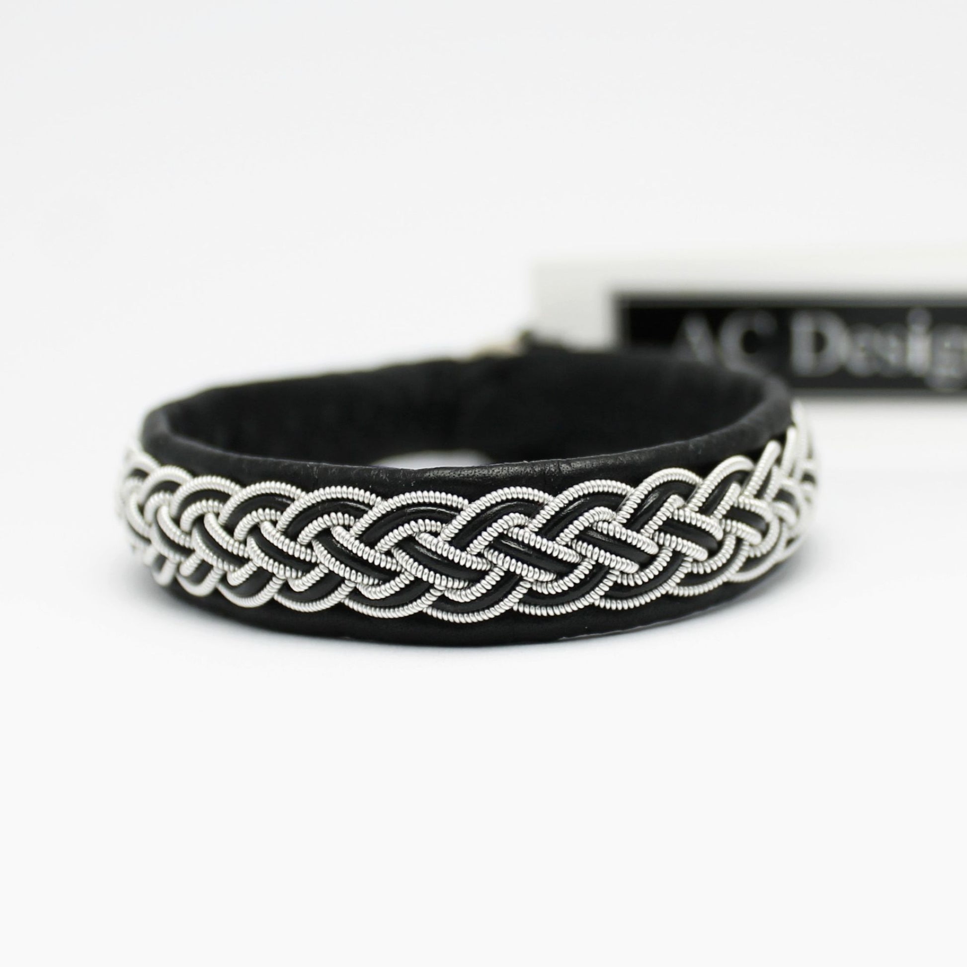 Sami bracelet with pewter wire braid and leather cord