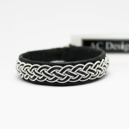 Sami bracelet with pewter wire braid and leather cord