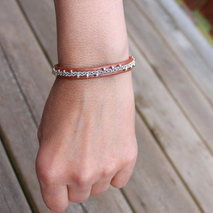 Sami bracelet with sterling silver beads on a womans wrist
