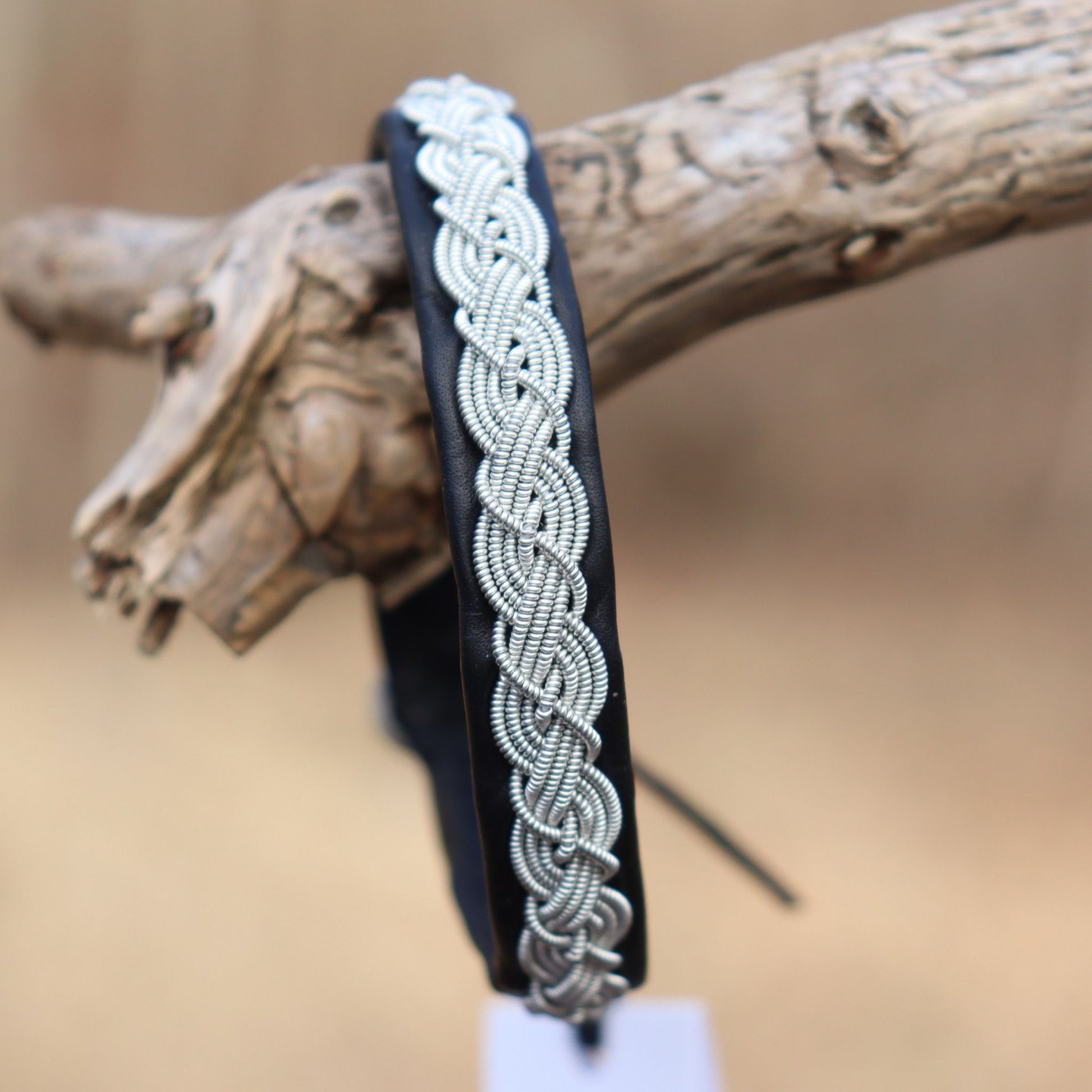 handcrafted sami bracelet otter in black reindeer leather