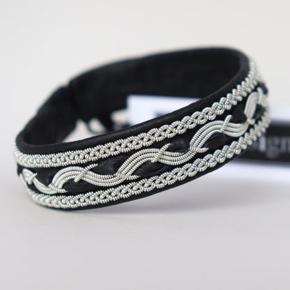 Close-up of a handcrafted black sami style bracelet