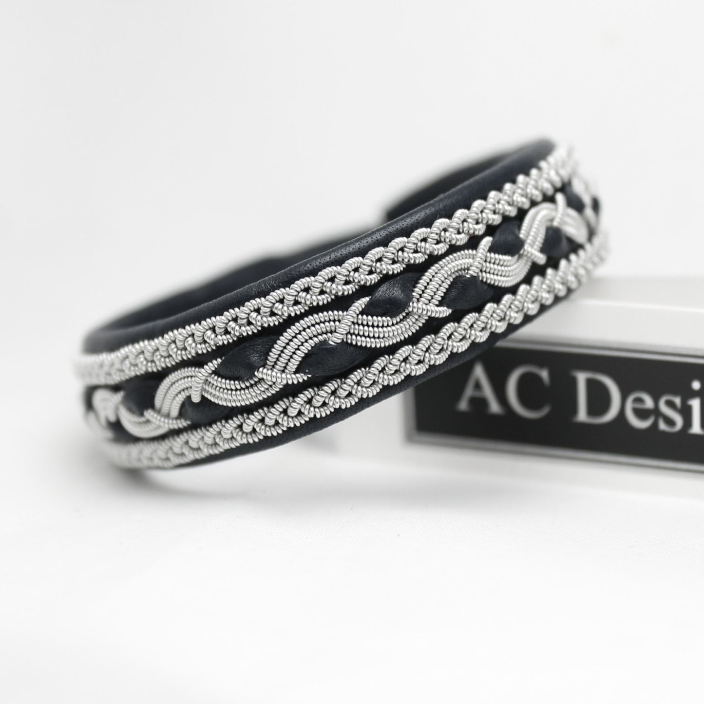 Nordic Sami bracelet in leather with braided pewter wire