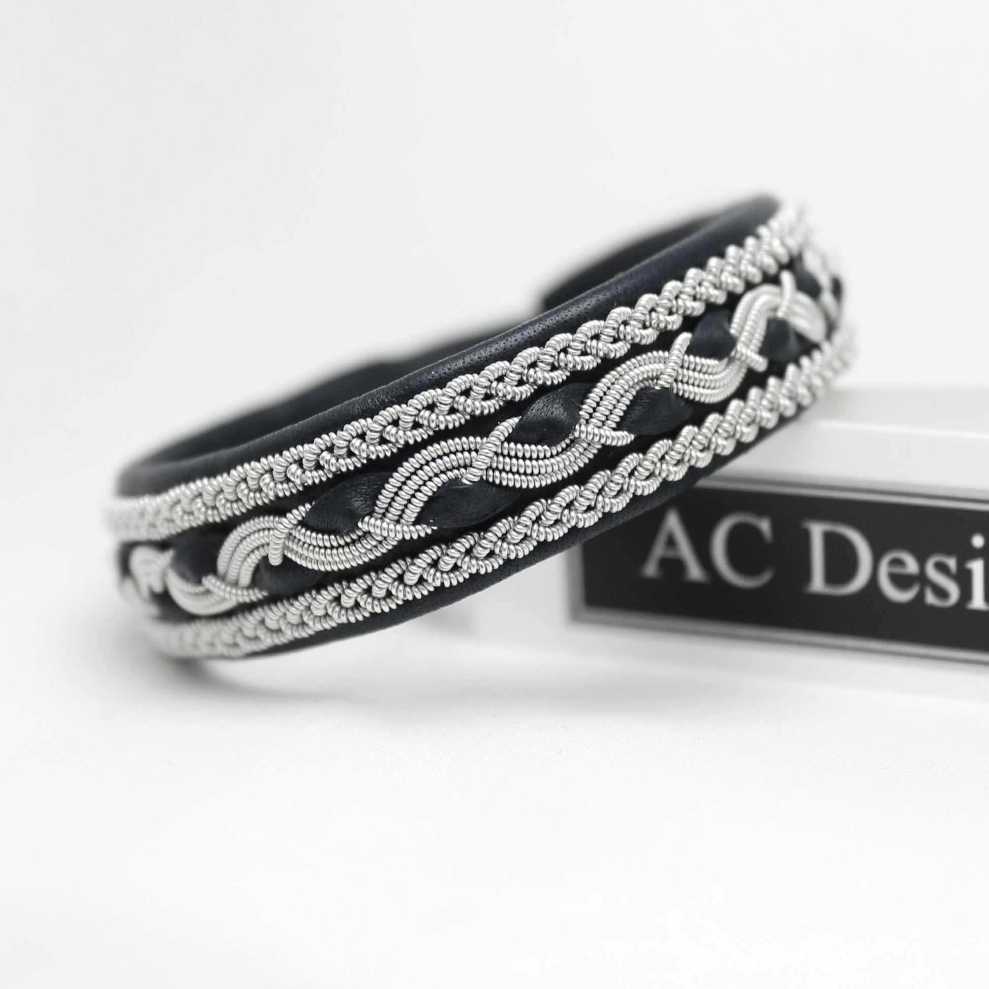 Nordic Sami bracelet in leather with braided pewter wire