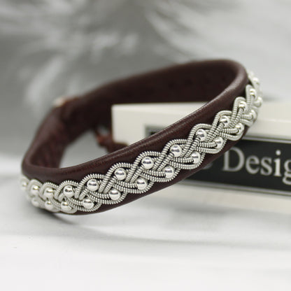 Sami  bracelet in reindeer leather featuring braided pewter thread and silver beads
