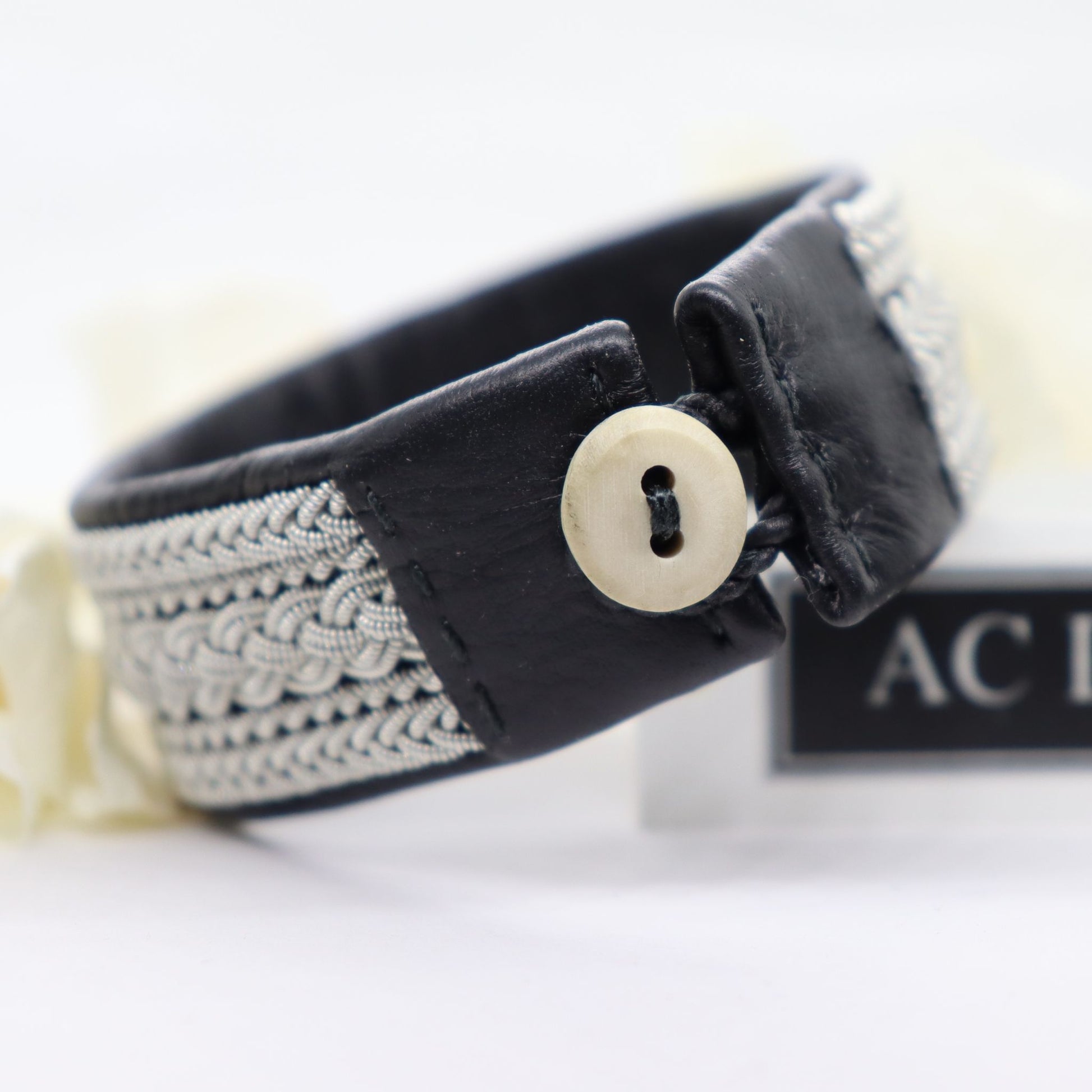 Button from reindeer antlers on a Sami bracelet