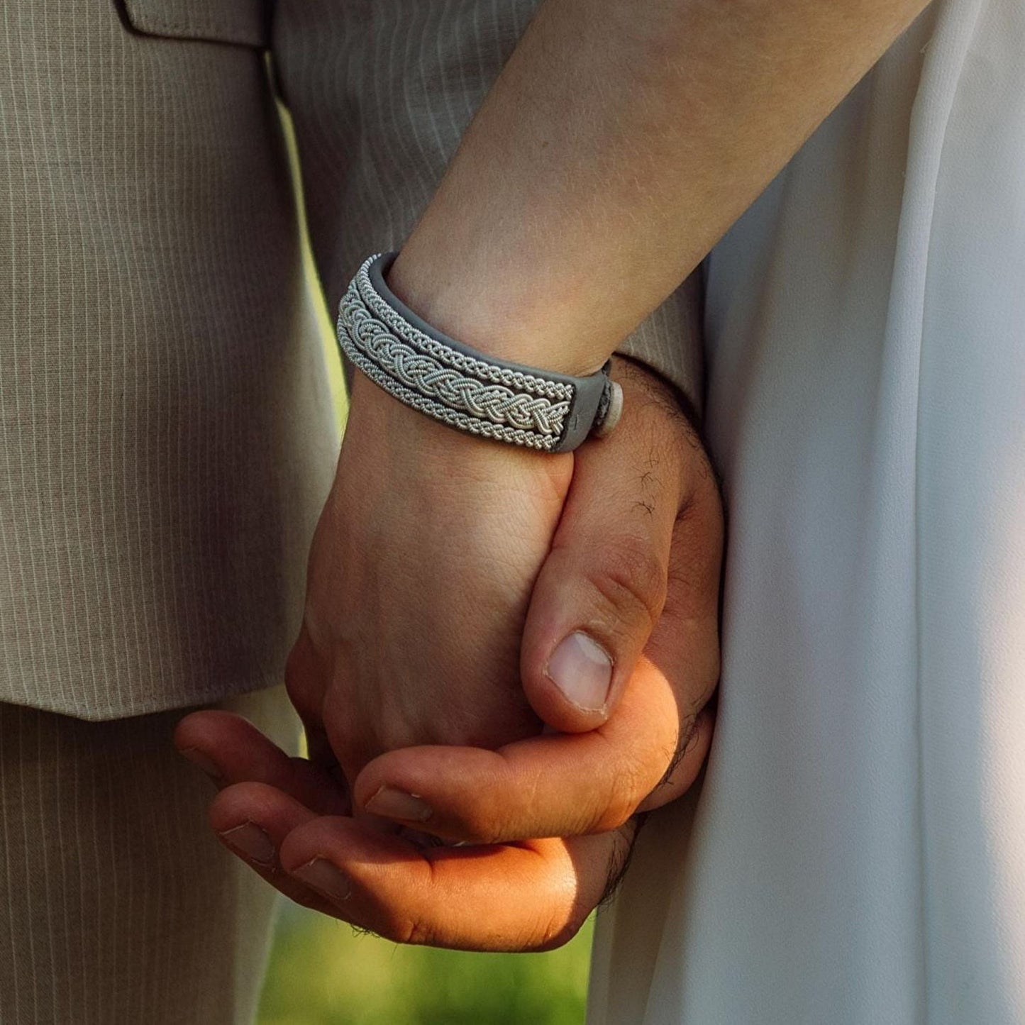 Sami bracelet on a brides wrist at a wedding