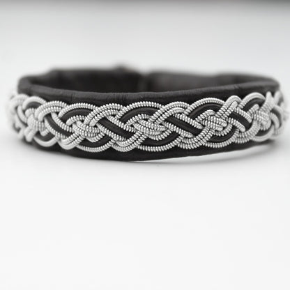 Handmade sami bracelet in black leather, pewter thread and leather cord  