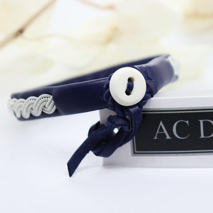 Sami bracelet with reindeer antler horn button