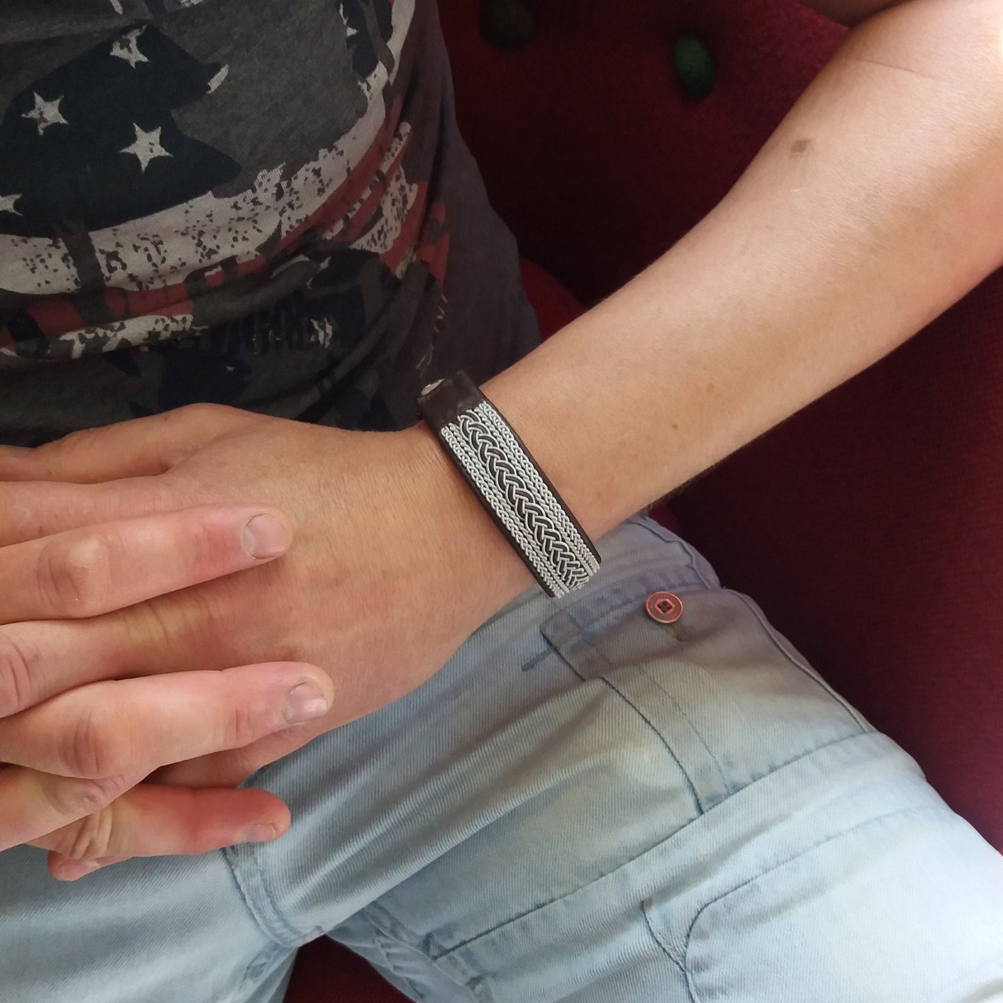 Sami pewter bracelet worn on mans wrist